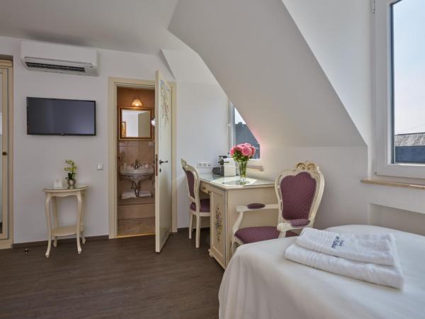 Apartment-Hotel am Rathaus : photo 1 de la chambre chambre deluxe double ou lits jumeaux