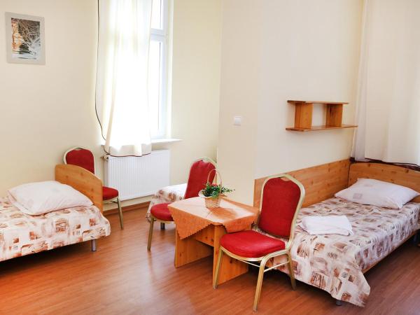 Ośrodek Wypoczynkowy Gryf II : photo 2 de la chambre chambre quadruple