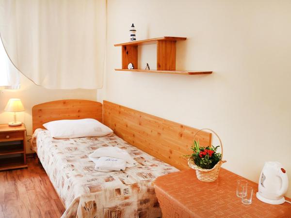 Ośrodek Wypoczynkowy Gryf II : photo 1 de la chambre chambre triple