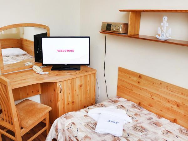 Ośrodek Wypoczynkowy Gryf II : photo 2 de la chambre chambre triple