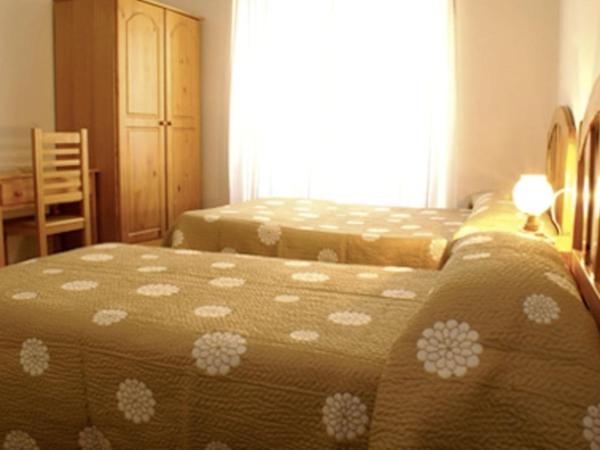 Hostal Las Torres : photo 2 de la chambre chambre double ou lits jumeaux