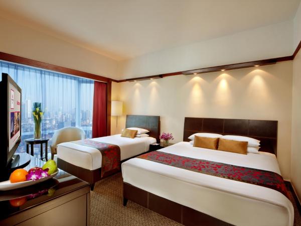 Millennium Hotel Sirih Jakarta : photo 2 de la chambre chambre familiale deluxe
