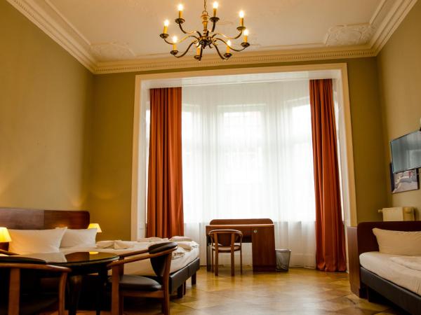 Hotel Astrid am Kurfürstendamm : photo 5 de la chambre chambre quadruple classique