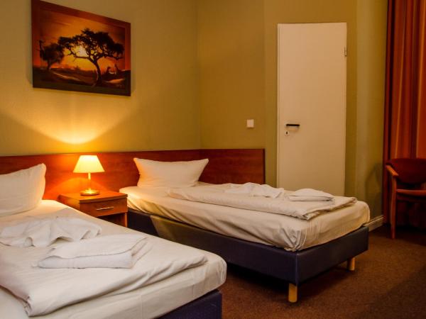 Hotel Astrid am Kurfürstendamm : photo 6 de la chambre chambre lits jumeaux standard