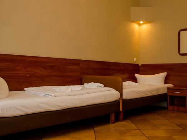 Hotel Astrid am Kurfürstendamm : photo 9 de la chambre chambre triple