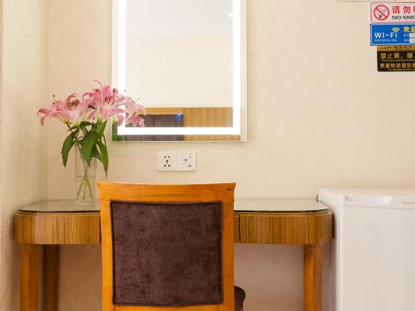 Guangzhou Compass Hotel : photo 3 de la chambre chambre lit king-size - vue sur jardin