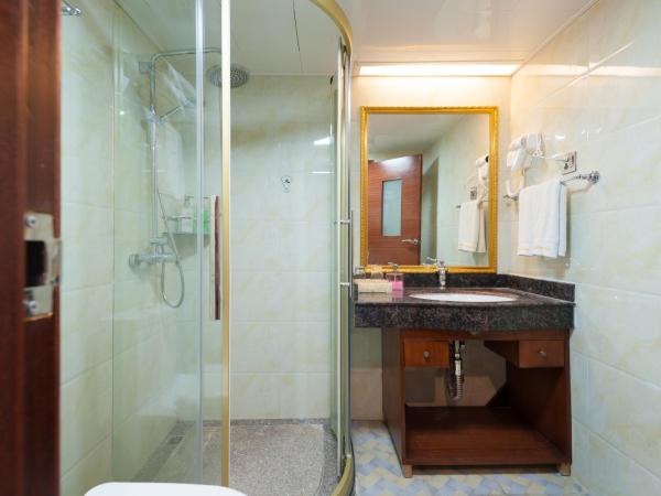 Guangzhou Compass Hotel : photo 1 de la chambre chambre lit king-size - vue sur jardin