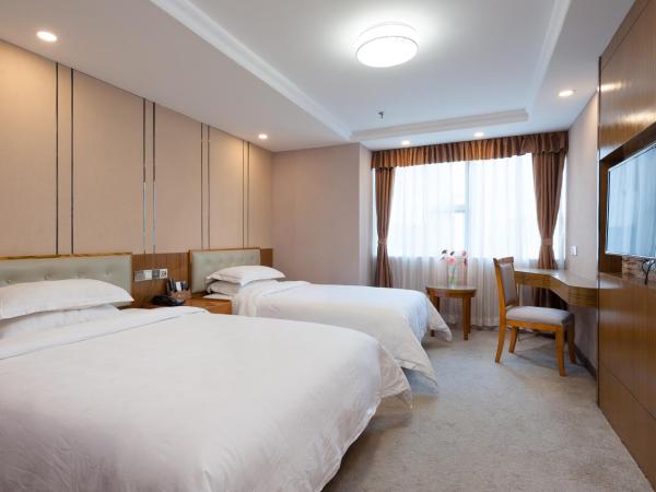 Guangzhou Compass Hotel : photo 2 de la chambre chambre lits jumeaux supérieure - vue sur jardin