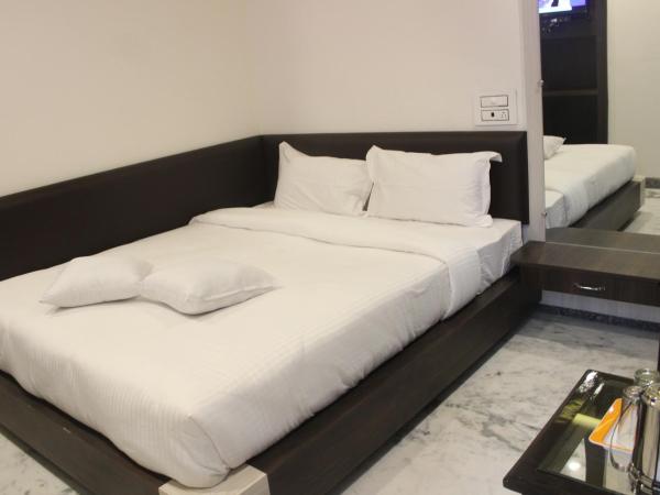 Hotel Delight : photo 2 de la chambre chambre double deluxe (2 adultes + 1 enfant)