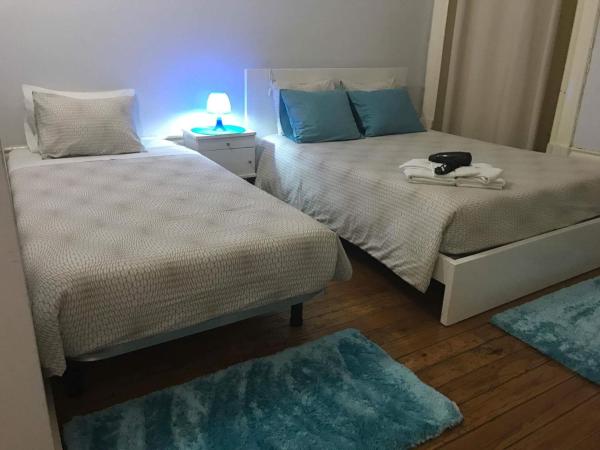 Jualis Guest House : photo 8 de la chambre chambre double avec salle de bains privative - vue sur jardin