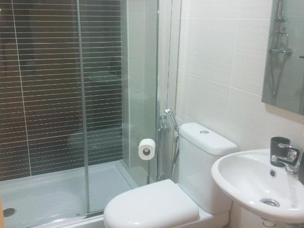 Jualis Guest House : photo 10 de la chambre chambre double supérieure - vue sur jardin