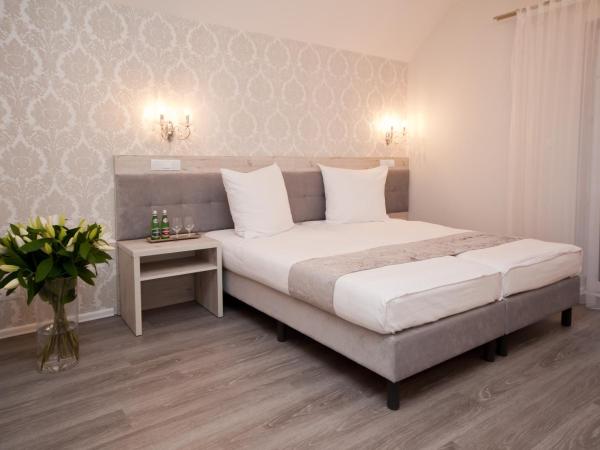 Dworek Bukowy Park : photo 3 de la chambre chambre lits jumeaux avec balcon