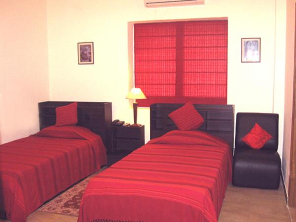 Red Arrow Residency : photo 1 de la chambre chambre deluxe double ou lits jumeaux