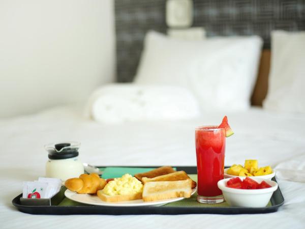 Sidra Pristine Hotel and Portico Halls : photo 6 de la chambre chambre familiale avec balcon