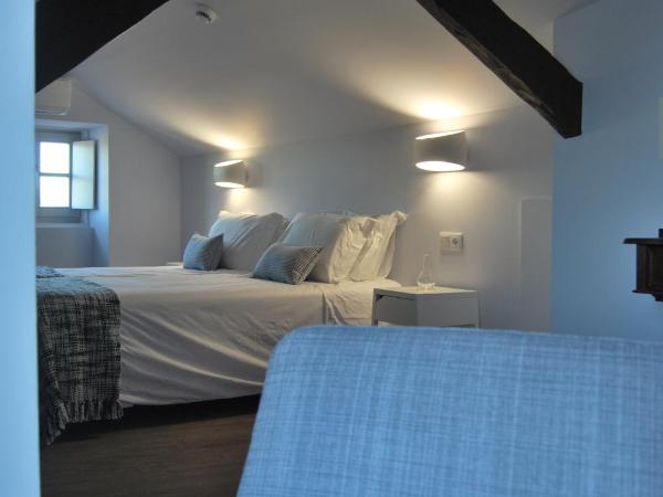 Guest House Santa Clara : photo 2 de la chambre chambre double ou lits jumeaux deluxe - vue sur ville 