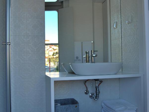 Guest House Santa Clara : photo 4 de la chambre chambre double ou lits jumeaux deluxe - vue sur ville 