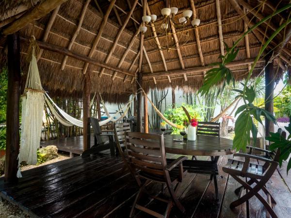 Villas El Encanto Cozumel : photo 7 de la chambre suite de luxe avec piscine privée