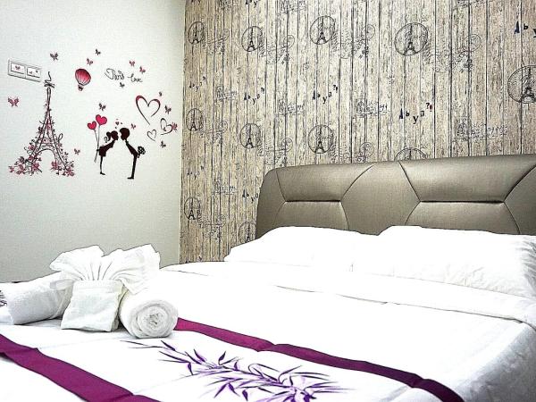D' Cozy Inn : photo 3 de la chambre chambre double ou lits jumeaux avec salle de bains