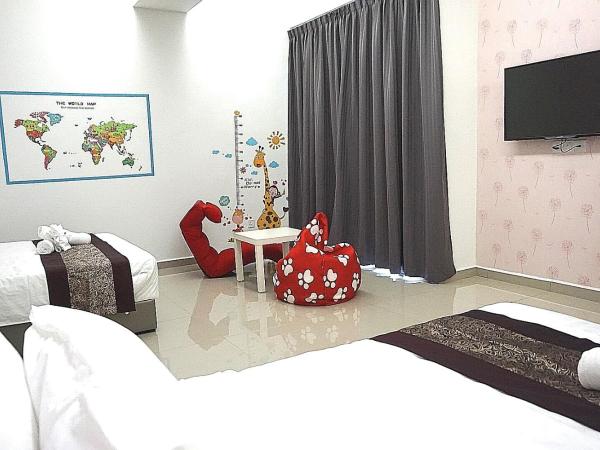 D' Cozy Inn : photo 2 de la chambre chambre quadruple avec salle de bains privative