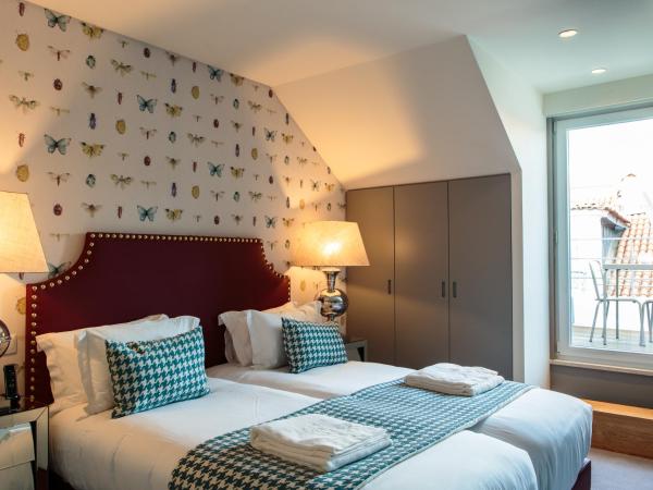 Dear Lisbon - Gallery House : photo 1 de la chambre chambre double ou lits jumeaux mansardée avec terrasse