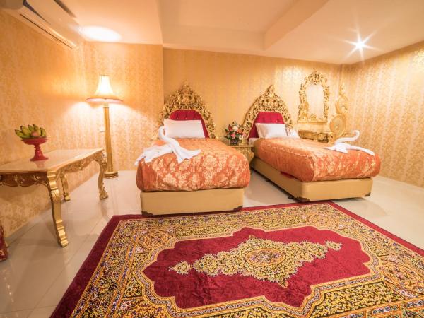 Nakaraj Princess Chiang Rai - Walking Street : photo 1 de la chambre chambre lits jumeaux deluxe