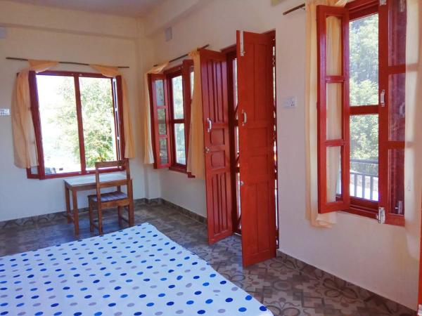 Dinesh House : photo 5 de la chambre chambre double deluxe avec balcon