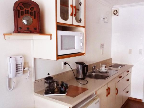 Rotorua Coachman Spa Motel : photo 3 de la chambre suite confort avec bain à remous