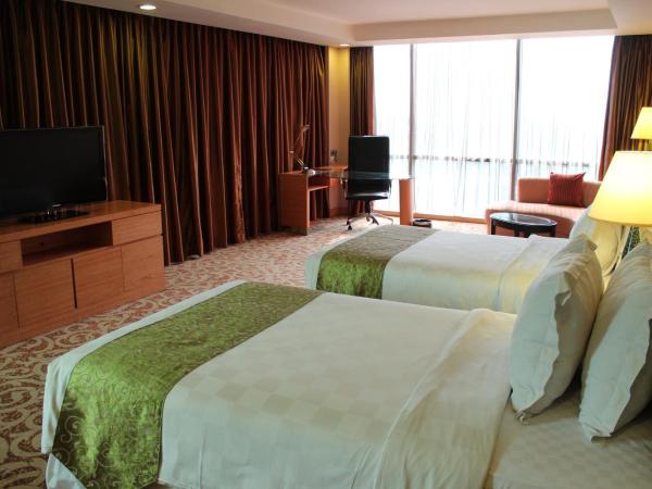 Wyndham Surabaya : photo 1 de la chambre chambre lits jumeaux exécutive - non-fumeurs