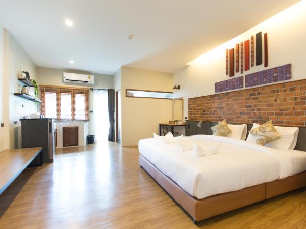 The Old City Wall Inn : photo 1 de la chambre chambre lit king-size deluxe