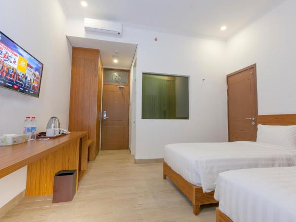 Java Village Resort by HOMEE Yogyakarta : photo 6 de la chambre chambre lits jumeaux deluxe