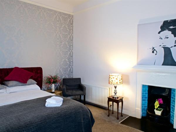 The Haven : photo 1 de la chambre chambre triple standard – premier Étage