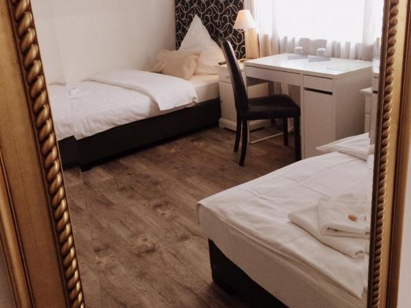 Hotel Heddernheimer Hof : photo 1 de la chambre chambre lits jumeaux Économique