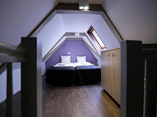City Hotel Amsterdam : photo 8 de la chambre chambre quadruple