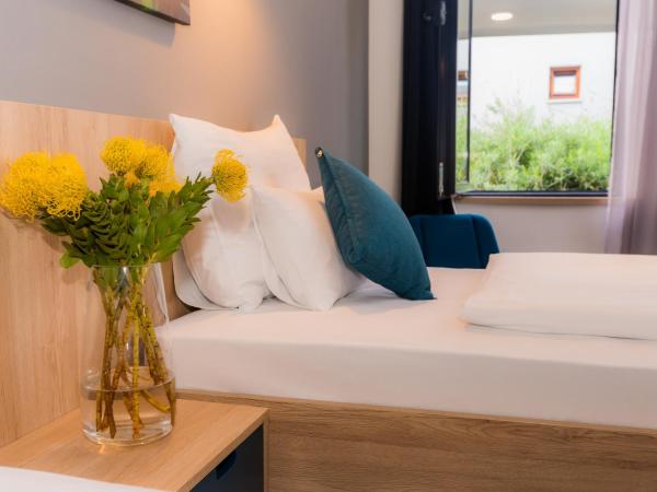 Hotel Academia : photo 8 de la chambre chambre lits jumeaux