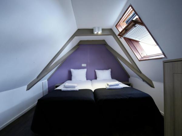 City Hotel Amsterdam : photo 6 de la chambre chambre quadruple