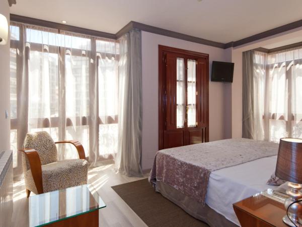 Hotel Vetusta : photo 5 de la chambre chambre triple