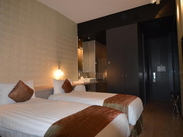 Amosa Liège City Centre Hotel : photo 7 de la chambre chambre lits jumeaux standard
