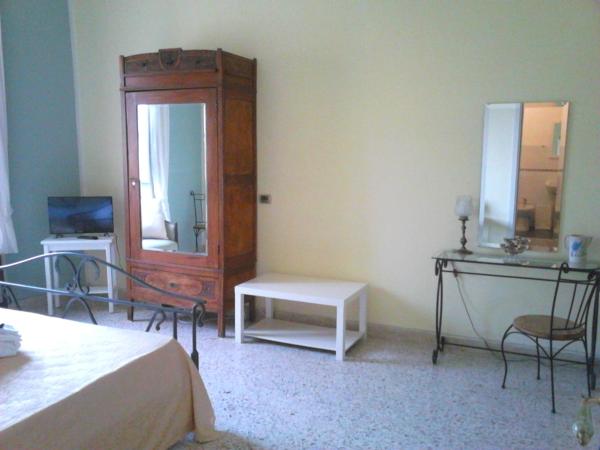 BellAqua : photo 2 de la chambre chambre triple avec salle de bains privative