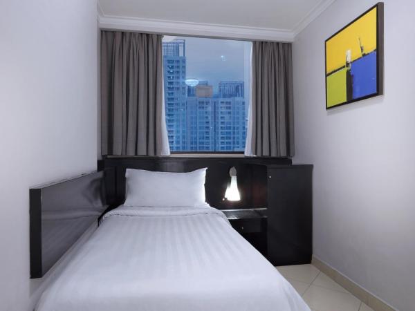 Horison Ultima Suite & Residences Rasuna Jakarta : photo 3 de la chambre grand executive double queen room