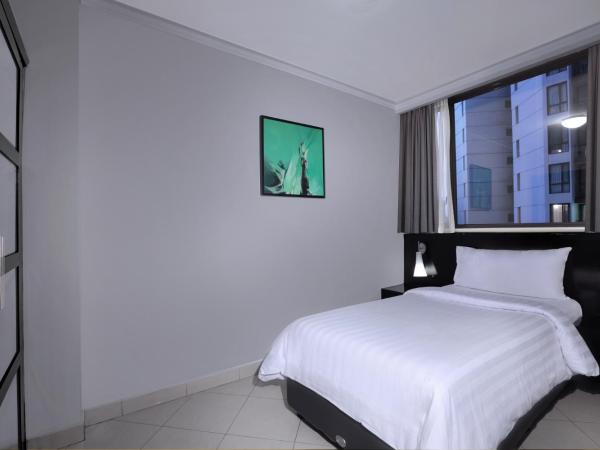 Horison Ultima Suite & Residences Rasuna Jakarta : photo 1 de la chambre grand executive double queen room