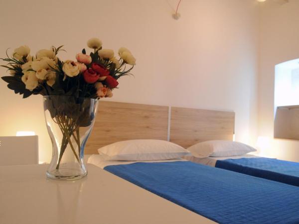 Arco Della Neve Guest House : photo 10 de la chambre chambre double ou lits jumeaux