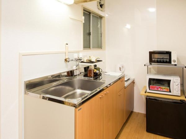 Guesthouse Kyoto Arashiyama : photo 5 de la chambre chambre lits jumeaux avec salle de bains privative