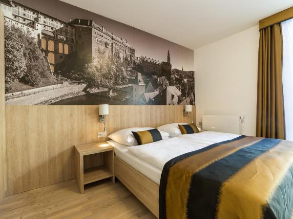 Garni hotel Castle Bridge : photo 2 de la chambre chambre double ou lits jumeaux deluxe - vue sur rivière