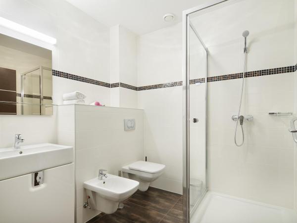 Paulay Downtown Apartments : photo 1 de la chambre chambre familiale standard