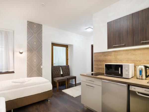 Paulay Downtown Apartments : photo 2 de la chambre chambre lits jumeaux standard