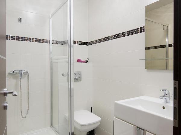 Paulay Downtown Apartments : photo 3 de la chambre chambre lits jumeaux standard