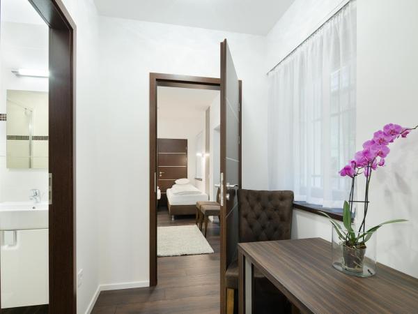 Paulay Downtown Apartments : photo 3 de la chambre chambre familiale standard