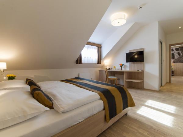 Garni hotel Castle Bridge : photo 1 de la chambre chambre quadruple confort