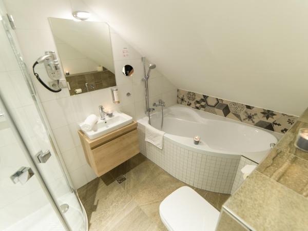 Garni hotel Castle Bridge : photo 6 de la chambre chambre deluxe double ou lits jumeaux