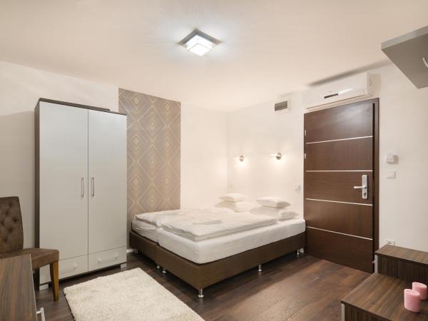 Paulay Downtown Apartments : photo 5 de la chambre chambre double standard